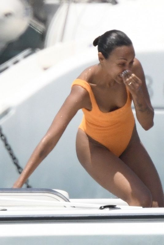 ZOE SALDANA in Swimsuit at a Yacht in Sardinia 07/23/2023