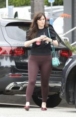 ZOOEY DESCHANEL ina Black Top and Brown Yoga Pants Out in Brentwood 07/05/2023
