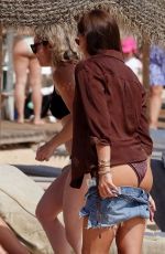 AMBER WISE in a Brown Bikini on Holiday in Portugal 08/23/2023