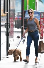 AMY ROBACH Out with Her Dog in New York 08/26/2023