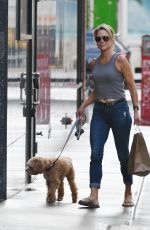 AMY ROBACH Out with Her Dog in New York 08/26/2023