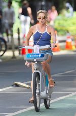AMY ROBACH Rents a Citibike Out in New York 08/08/2023