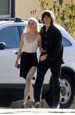 ANYA TAYLOR-JOY and Malcolm McRae Leaves a Friend