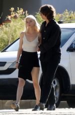 ANYA TAYLOR-JOY and Malcolm McRae Leaves a Friend