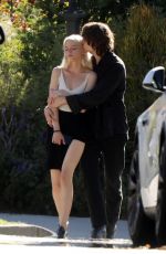 ANYA TAYLOR-JOY and Malcolm McRae Leaves a Friend