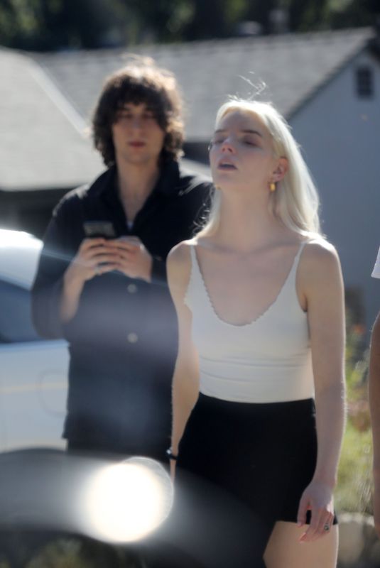 ANYA TAYLOR-JOY and Malcolm McRae Leaves a Friend