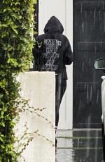 ARIANA MADIX Braves the Storm as She Arrives at Her Home in Los Angeles 08/20/2023