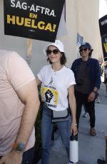 CAMILLA BELLE at SAG-AFTRA and WGA Strike at Warner Brothers Studios in Burbank 08/18/2023