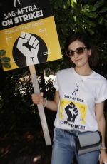 CAMILLA BELLE at SAG-AFTRA and WGA Strike at Warner Brothers Studios in Burbank 08/18/2023