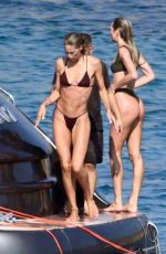 CANDICE SWANEPOEL, DOUTZEN KROES and JOAN SMALLS in Bikinis on Holiday on Mykonos Islands 08/21/2023