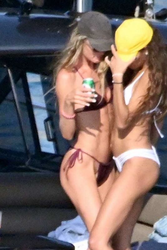 CANDICE SWANEPOEL, DOUTZEN KROES and JOAN SMALLS in Bikinis on Holiday on Mykonos Islands 08/21/2023