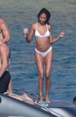 CANDICE SWANEPOEL, DOUTZEN KROES and JOAN SMALLS in Bikinis on Holiday on Mykonos Islands 08/21/2023
