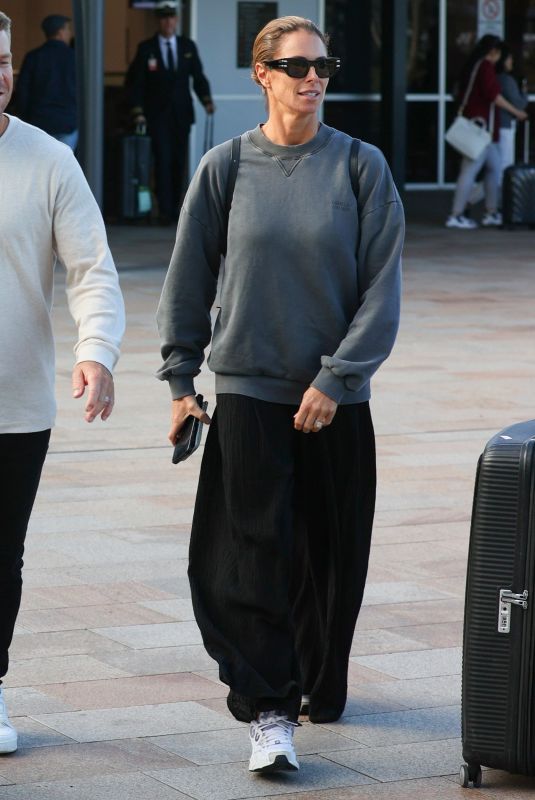 CANDICE WARNER Arrives at Sydney International Airport 08/22/2023