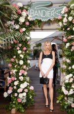CHARLOTTE MCKINNEY at Lacoste x Bandier Launch Dinner in Beverly Hills 08/23/2023