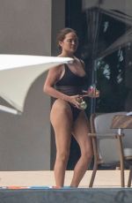 CHRISSY TEIGEN in Swimsuit on Vacation in Puerto Vallarta 08/08/2023
