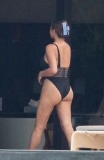 CHRISSY TEIGEN in Swimsuit on Vacation in Puerto Vallarta 08/08/2023