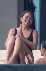 CHRISSY TEIGEN in Swimsuit on Vacation in Puerto Vallarta 08/08/2023