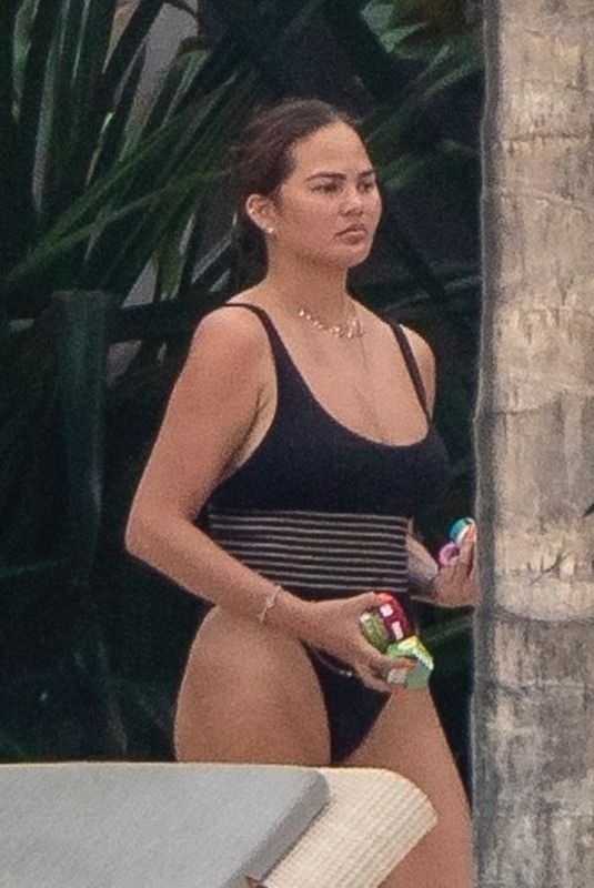 CHRISSY TEIGEN in Swimsuit on Vacation in Puerto Vallarta 08/08/2023