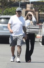 CHRISTINA and Joshua HALL Shopping at Costco in Huntington Beach" (01.08.2023