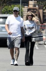 CHRISTINA and Joshua HALL Shopping at Costco in Huntington Beach" (01.08.2023