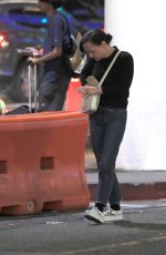 CHRISTINA RICCI Takes a Cigarette Break at LAX 08/07/2023