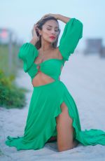 DORINA GUILLEN in a Green Dress at a Photoshoot in Miami 08/14/2023