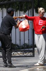 ELLE FANNING Has an Item Delivered to Her Home in Los Angeles 08/21/2023