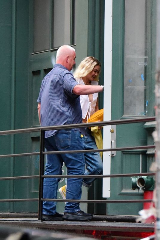 GIGI HADID Arrives at Taylor Swift