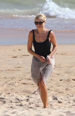 HOLLY WILLOGHBY in Swimsuit at a Beach in Algarve in Portugal 08/05/82023