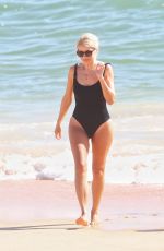 HOLLY WILLOGHBY in Swimsuit at a Beach in Algarve in Portugal 08/05/82023