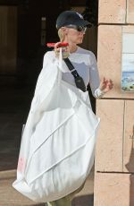 JANUARY JONES Picking up a Wedding Fress for Her Sister