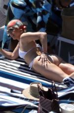 JENNIFER LOPEZ in a White Bikini at a Photoshoot in Italy 08/10/2023