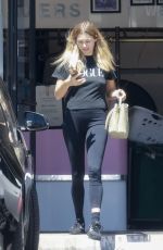 JESSICA HART leaves a Dry Cleaner in Los Feliz 08/14/2023