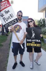 KATE FLANNERY at SAG-Aftra and WGA Picket Line at Netflix Offices in Los Angeles 08/14/2023