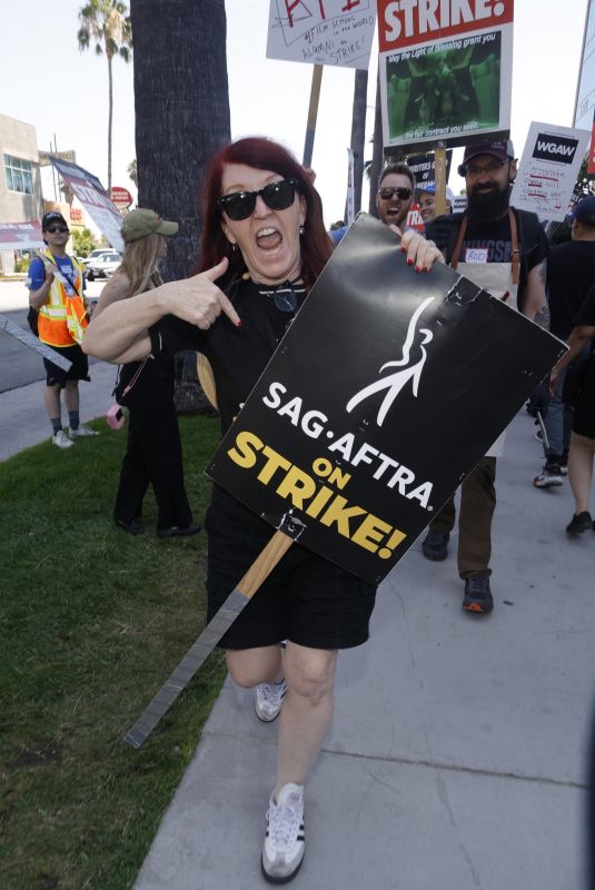KATE FLANNERY at SAG-Aftra and WGA Picket Line at Netflix Offices in Los Angeles 08/14/2023