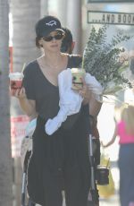 KATHERINE SCHWARZENEGGER and Chris Pratt Out with Their Baby in Los Angeles 08/27/2023