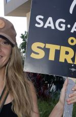 KATHRYN COCHRANE at SAG-Aftra and WGA Picket Line at Netflix Offices in Los Angeles 08/14/2023