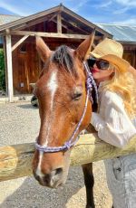 KATHRYN NEWTON at a Photoshoot, August 2023