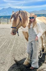 KATHRYN NEWTON at a Photoshoot, August 2023
