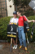 KATIE CASSIDY and WILLA HOLLAND at Picket Line at Warner Brothers Studios in Burbank 08/11/2023
