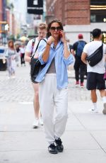 KATIE HOLMES Chats on Her Phone Out in New York 08/09/2023