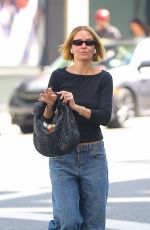 LARA WORTHINGTON Out on a City Bike in New York 08/18/2023