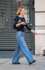 LARA WORTHINGTON Out on a City Bike in New York 08/18/2023