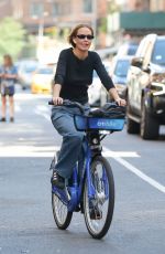 LARA WORTHINGTON Out on a City Bike in New York 08/18/2023