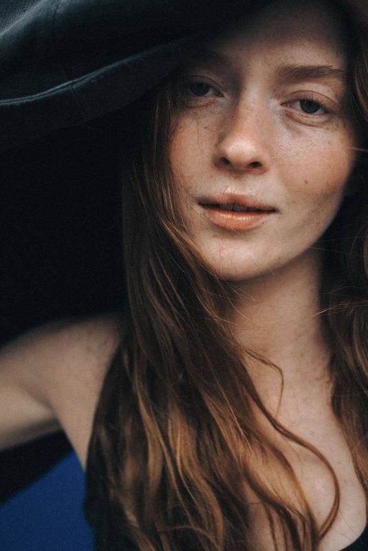 LARSEN THOMPSON at a Photoshoot, August 2023