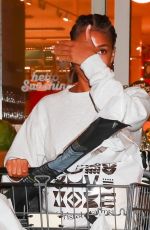 LORI HARVEY Does Some Late Night Hurricane Prep-shopping in West Hollywood 08/19/2023