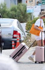 MARGOT ROBBIE Catching a Ferry in Greece 08/28/2023