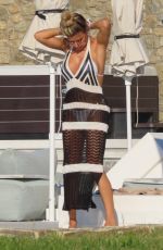 MEGAN BARTON HANSON in a White Bikini on Vacation in Mykonos 08/01/2023