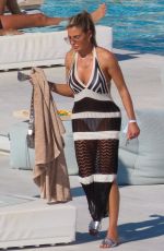 MEGAN BARTON HANSON in a White Bikini on Vacation in Mykonos 08/01/2023