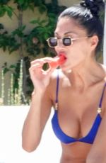 NICOLE SHERZINGER in a Blue Bikini at a Beach in Sardinia 08/10/2023
